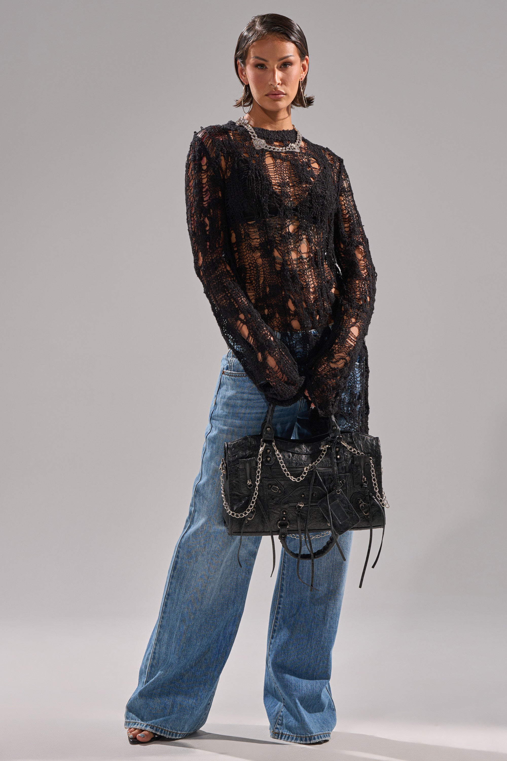 ASYMMETRICAL KNIT SWEATER